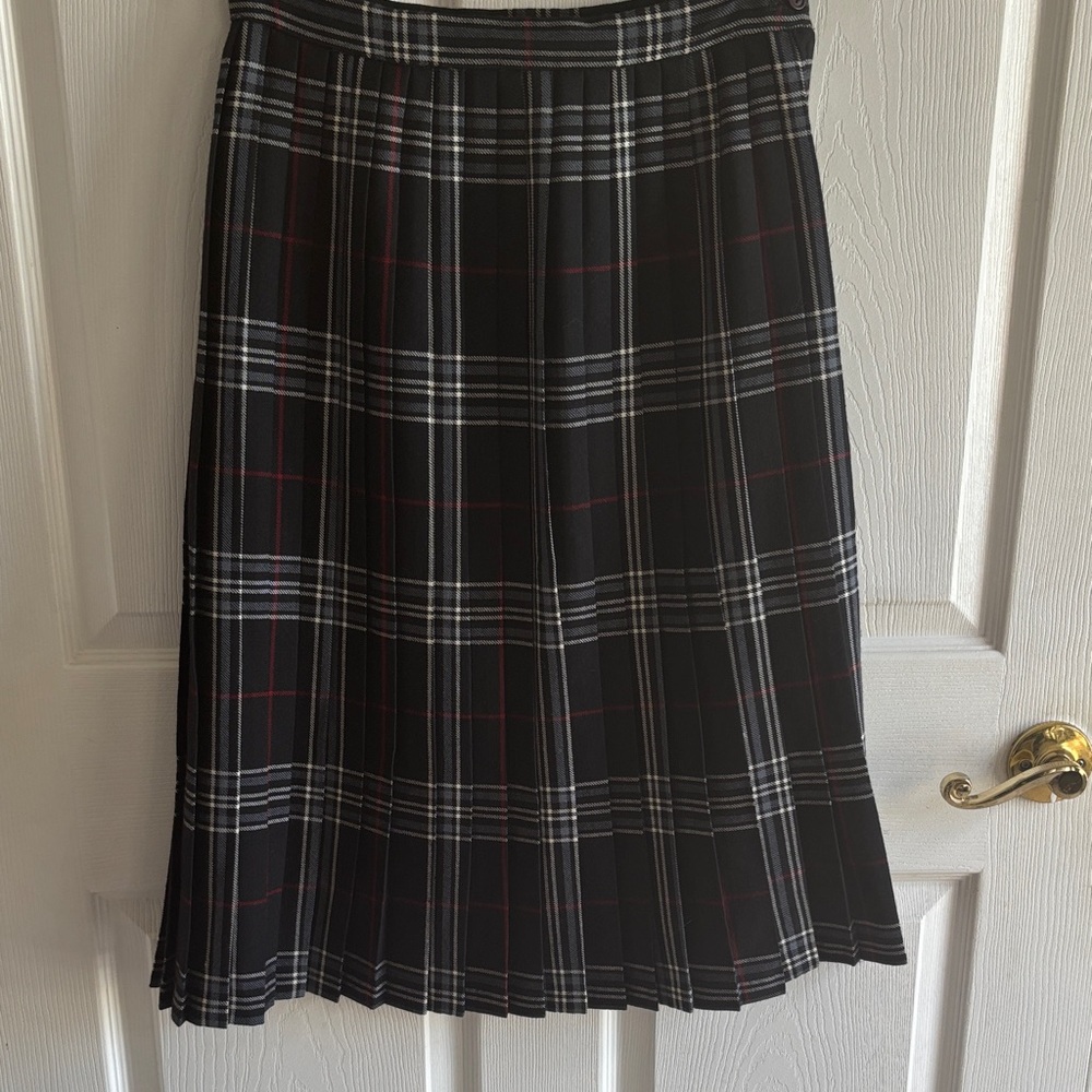 Vintage 100% wool pleated plaid skirt by Mr. K. Size 12. Made in Canada.